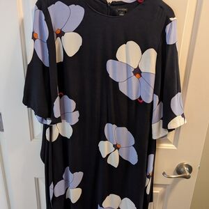 Chic Black Dress with Bold Floral Design